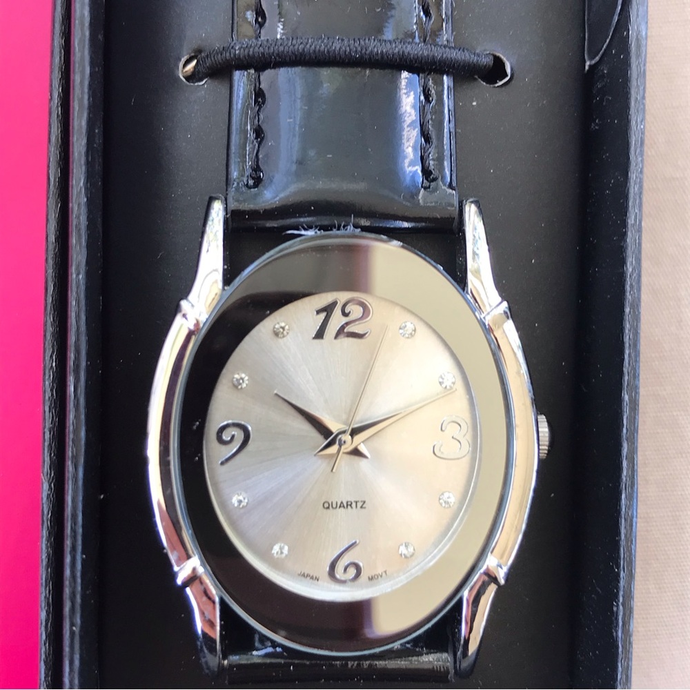 Avon Silver and Black watch